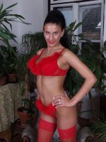Foxy bicth in red stockings baring all and revealing wet cunt