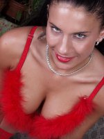 Foxy bicth in red stockings baring all and revealing wet cunt