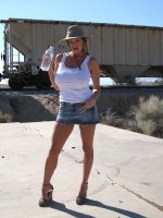 Kelly shows off her super hot tits in the middle of the desert. - MILF,  Big Tits,  Kelly Madison