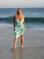 Kelly strolls on the beach in a white bikini and gets wet. - MILF,  Big Tits,  Kelly Madison