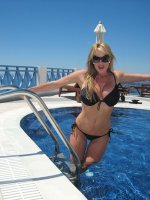 Kelly gives a blowjob by the pool in Santorini. - MILF,  Big Tits,  Kelly Madison