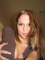 Cassandra unknowingly exposing her big breasts with these self shot pics from her cellphone